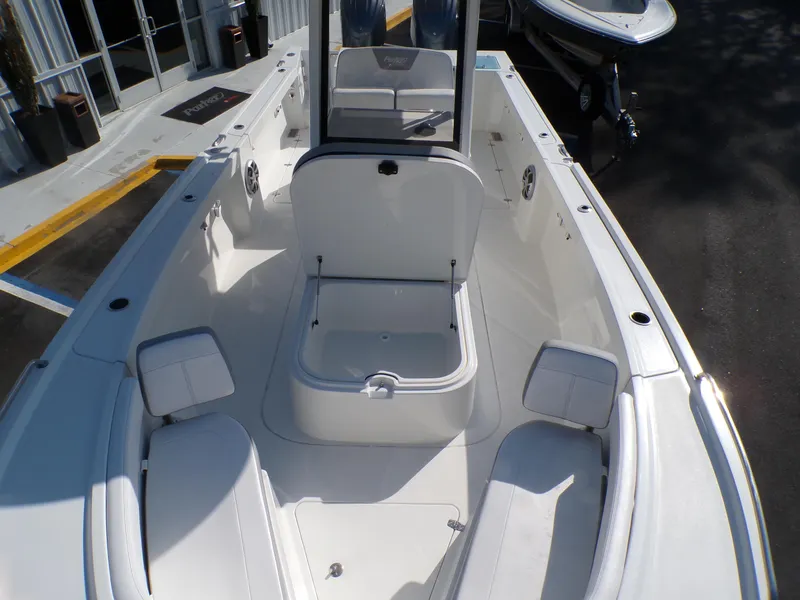 Slide: The Image of 2024 Parker 2600 Center Console boat interior with seating and storage. - 45