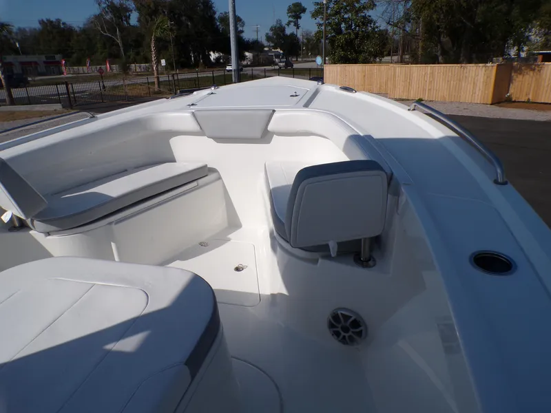 Slide: The Image of 2024 Parker 2600 Center Console boat interior with seating and storage compartments. - 47