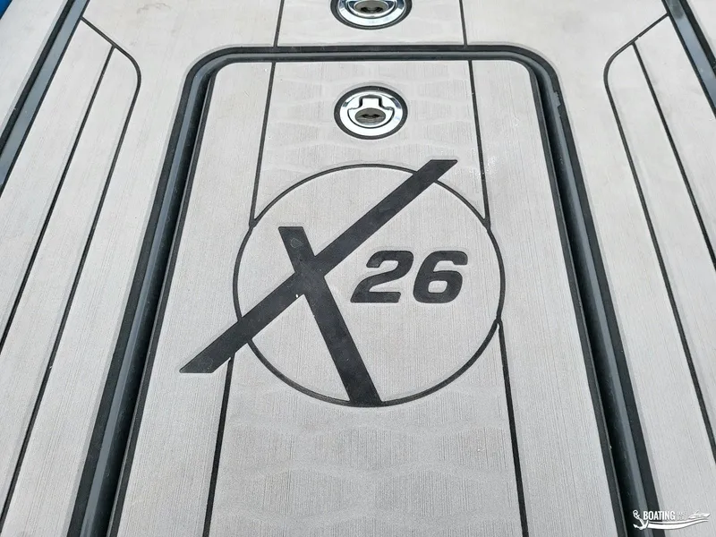 Slide: The Image of 2021 MasterCraft X26 boat deck with logo and sleek design. - 17