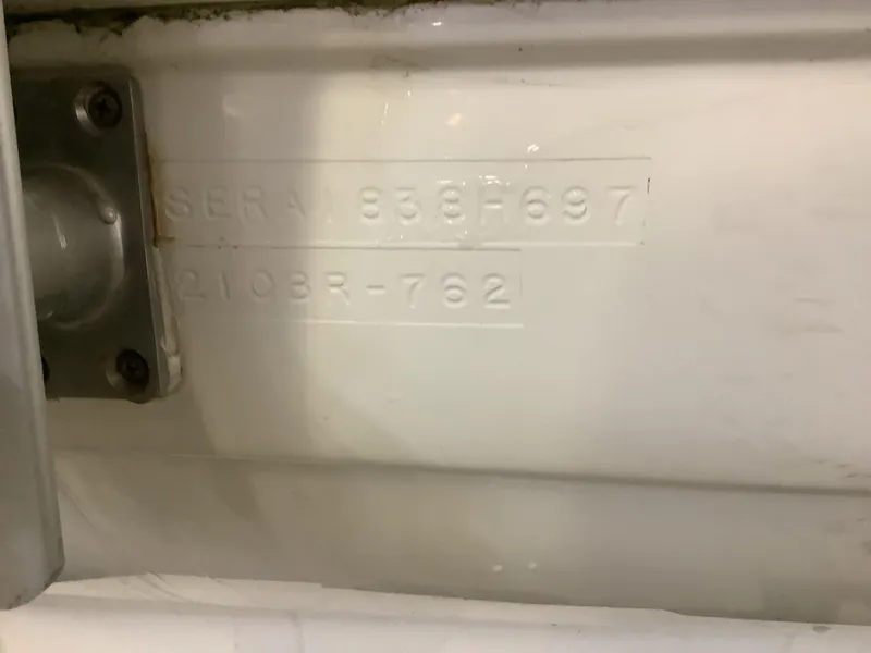 Slide: The Image of Hull identification number on 1997 Sea Ray 210 Open Bow boat. - 14