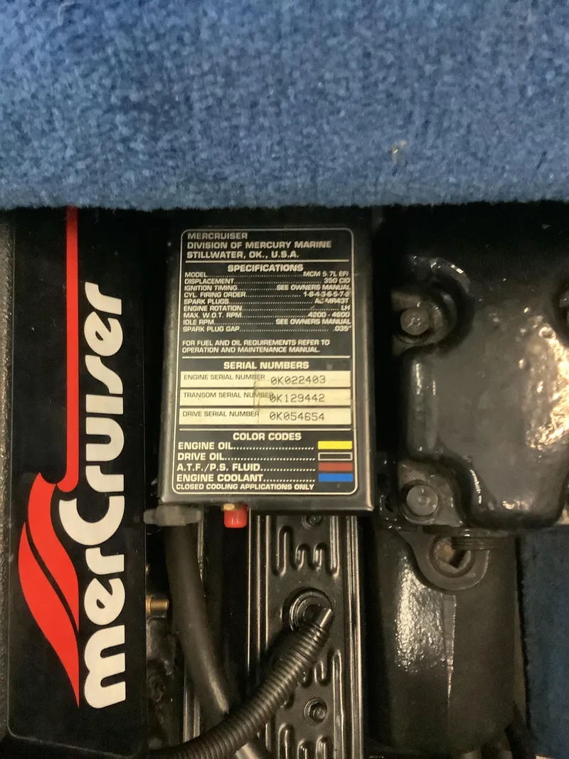 Slide: The Image of MerCruiser engine label on a 1997 Sea Ray 210 Open Bow boat. - 15