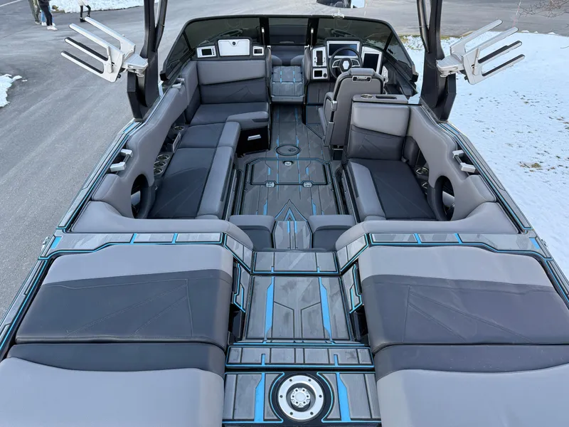 Slide: The Image of 2022 Supra SL boat interior with sleek seating and modern design. - 17