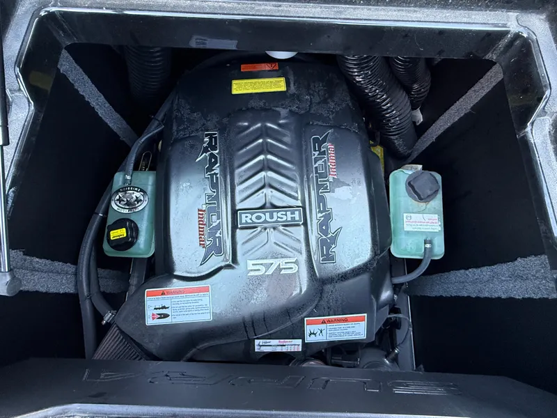 Slide: The Image of 2022 Supra SL engine compartment featuring Roush Raptor 575 motor. - 22