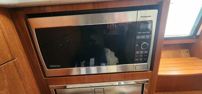 Slide: The Image of Microwave in 2012 Tiara Yachts 3100 Coronet, wooden interior detail. - 25
