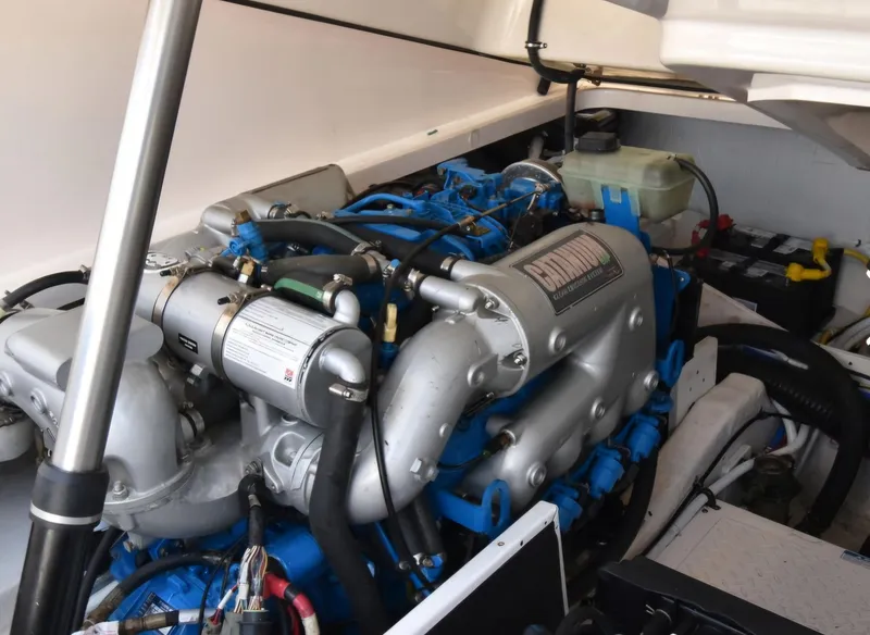 Slide: The Image of Engine compartment of a 2012 Tiara Yachts 3100 Coronet, showcasing detailed mechanical components. - 36