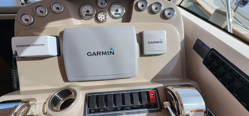 Slide: The Image of Dashboard of 2012 Tiara Yachts 3100 Coronet with Garmin navigation system. - 4