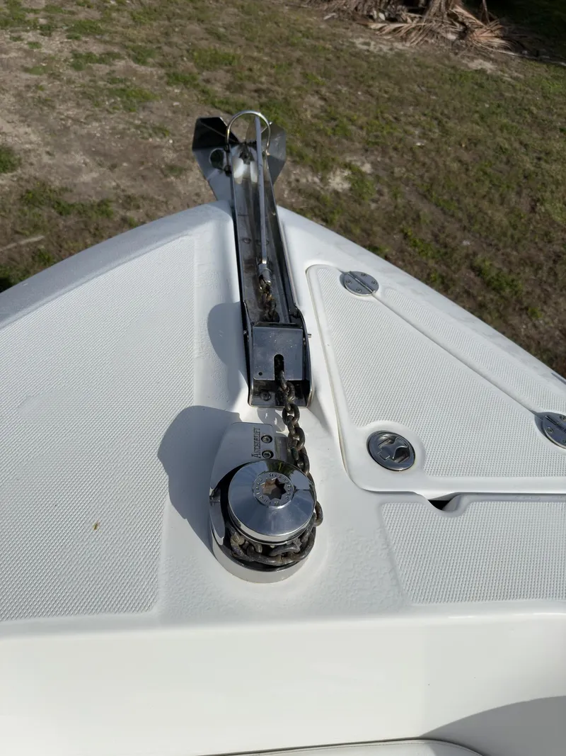 Slide: The Image of Bow of 2007 Everglades 290 CC boat with anchor chain and winch system. - 21