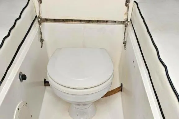 Slide: The Image of 1993 Marlin Yachts Cuddy SF boat toilet, compact and functional marine design. - 12