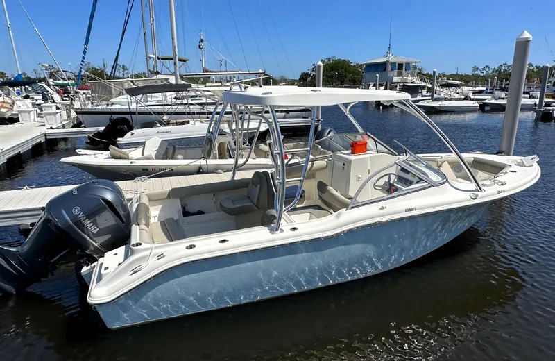 The Image of 2023 Key West 239 DFS boat on trailer in indoor storage facility. - 0