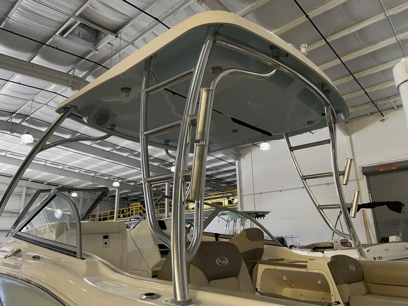 Slide: The Image of 2023 Key West 239 DFS boat interior with T-top in a showroom. - 16