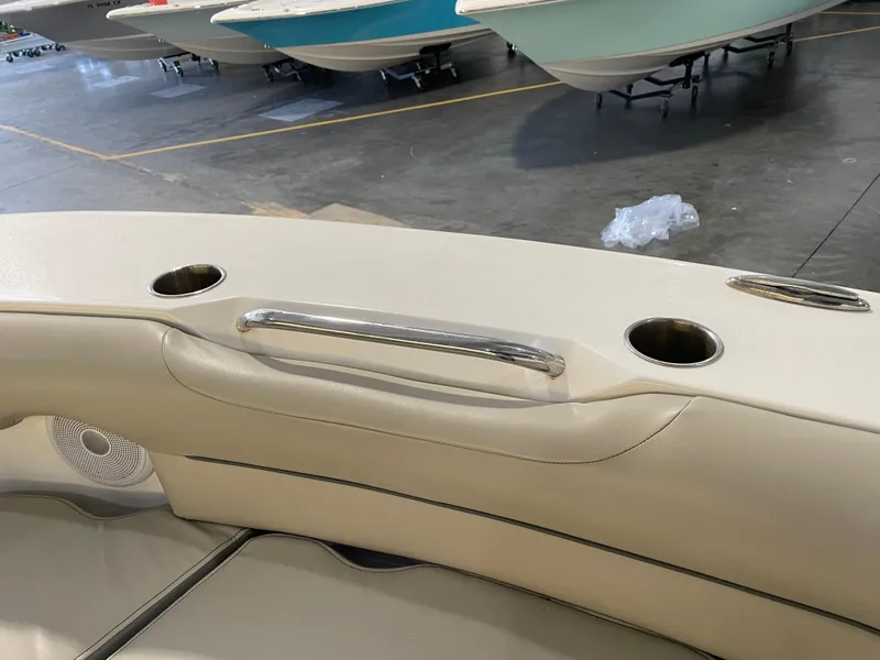 Slide: The Image of Interior of 2023 Key West 239 DFS boat with cup holders and handle. - 21