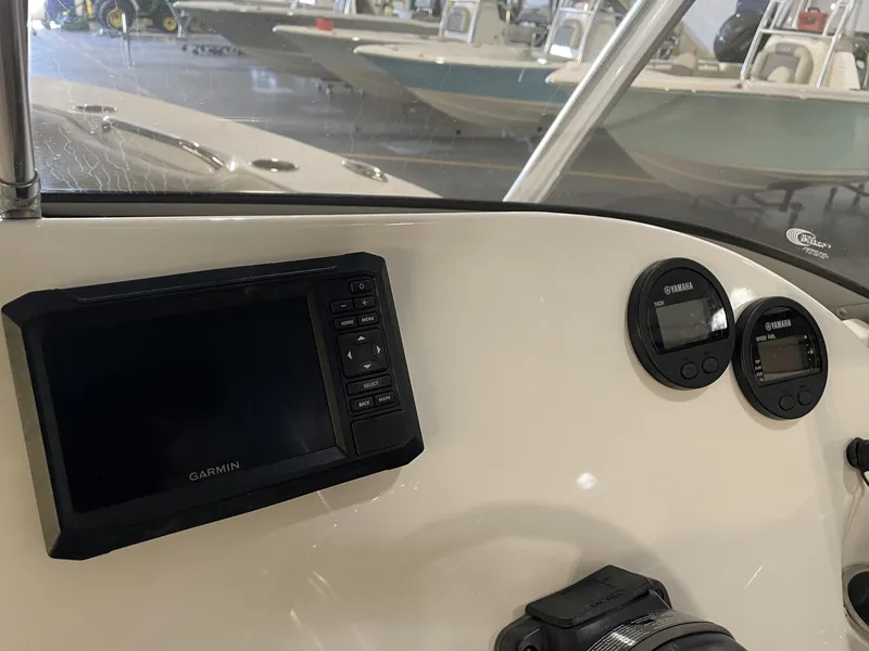 Slide: The Image of 2023 Key West 239 DFS dashboard with Garmin display and Yamaha gauges. - 24