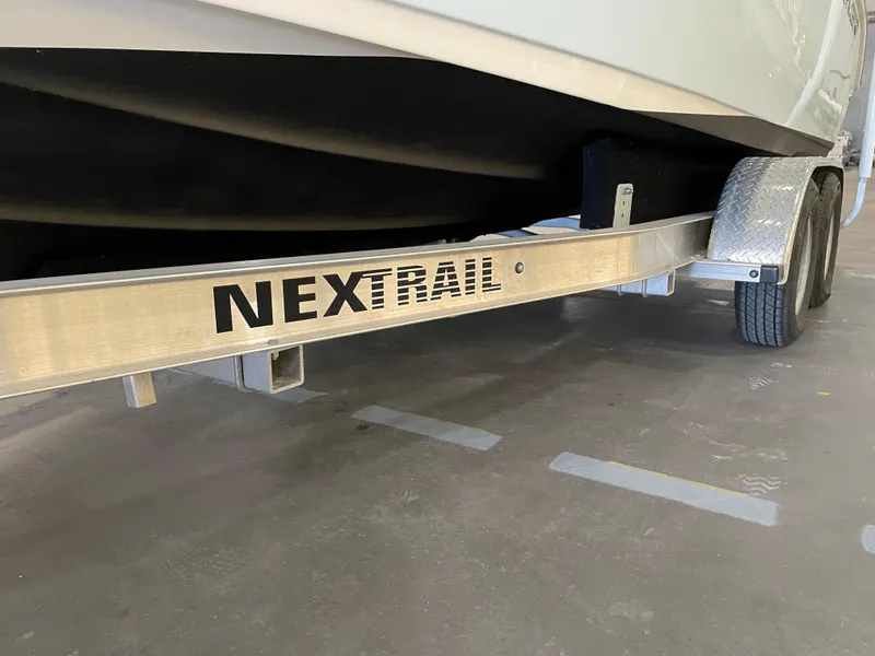 Slide: The Image of Trailer for 2023 Key West 239 DFS boat, featuring NexTrail branding. - 38