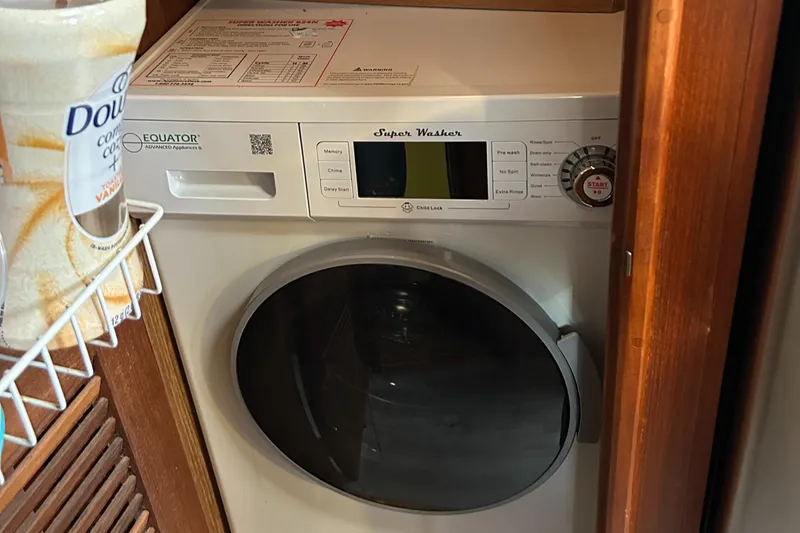 Slide: The Image of Compact washer in 1985 Viking 50 Cockpit MY yacht interior. - 19