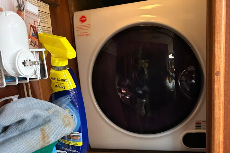 Slide: The Image of Laundry area on a 1985 Viking 50 Cockpit MY yacht with cleaning supplies. - 20