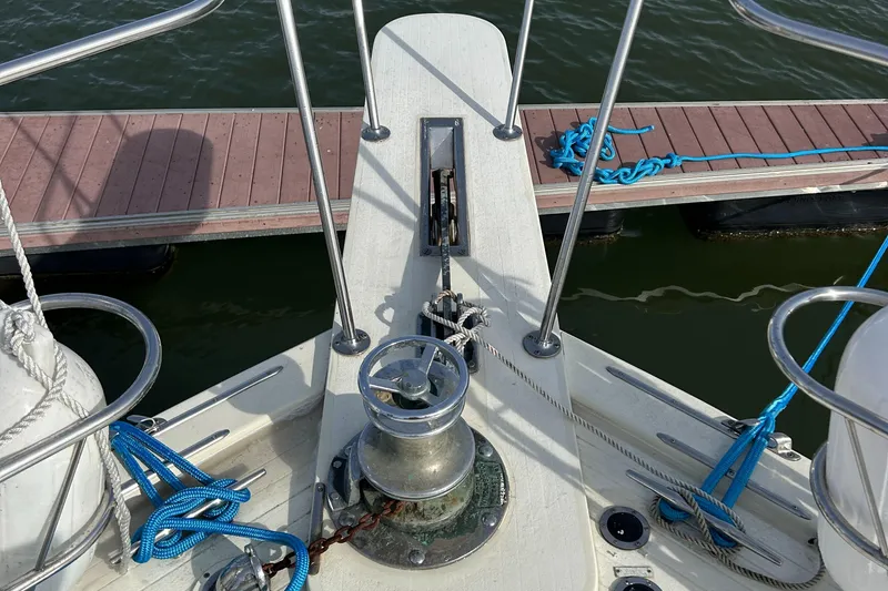 Slide: The Image of Bow of 1985 Viking 50 Cockpit MY yacht with winch and ropes. - 32