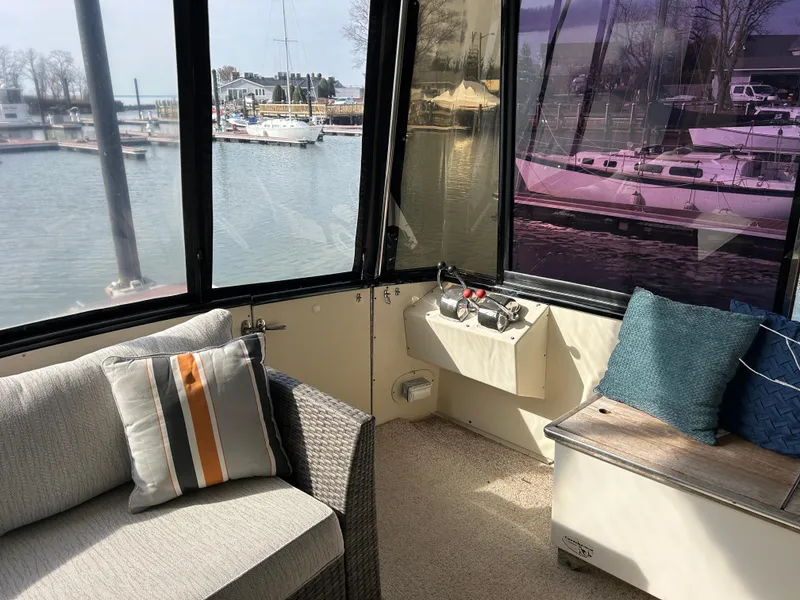 Slide: The Image of Interior of 1985 Viking 50 Cockpit MY yacht with marina view. - 7