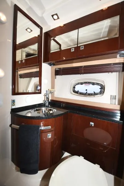 Slide: The Image of Luxurious bathroom interior of 2010 Sea Ray 450 Sundancer yacht with modern fixtures. - 16