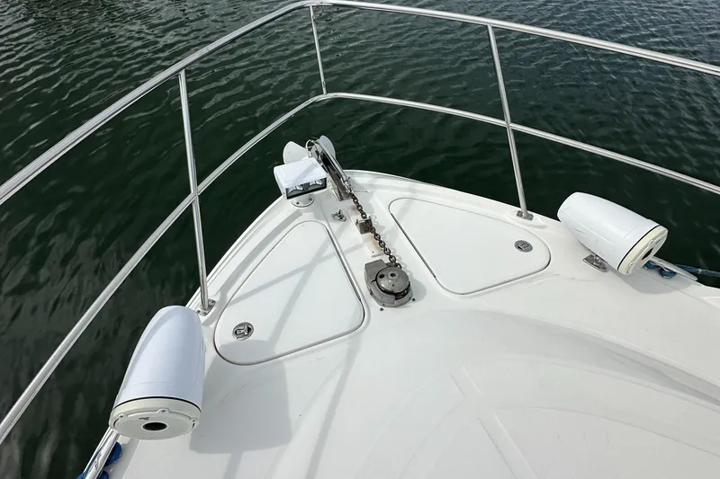 Slide: The Image of Bow of 2010 Sea Ray 470 Sundancer yacht with anchor and railing. - 27