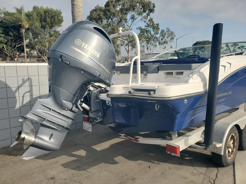 Slide: The Image of 2020 Chaparral 21 SSi OB boat with Yamaha outboard motor on trailer. - 7