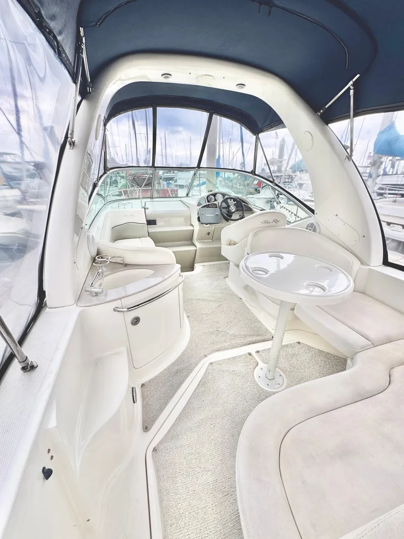 Slide: The Image of Interior of a 2005 Sea Ray Sundancer 260 yacht with seating area. - 13