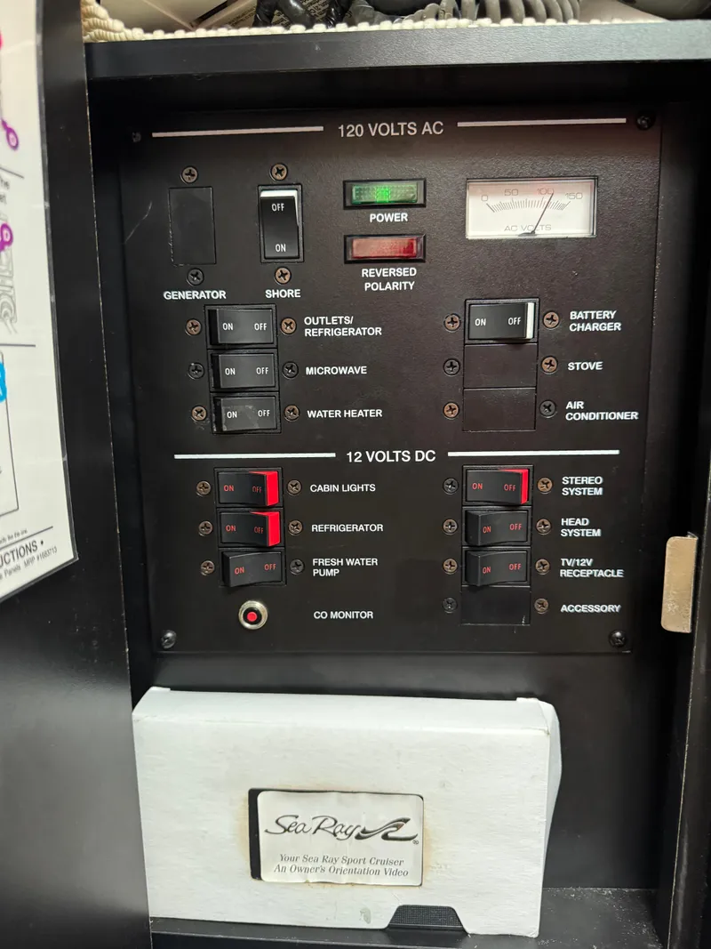 Slide: The Image of Control panel of 2005 Sea Ray Sundancer 260 boat. - 23