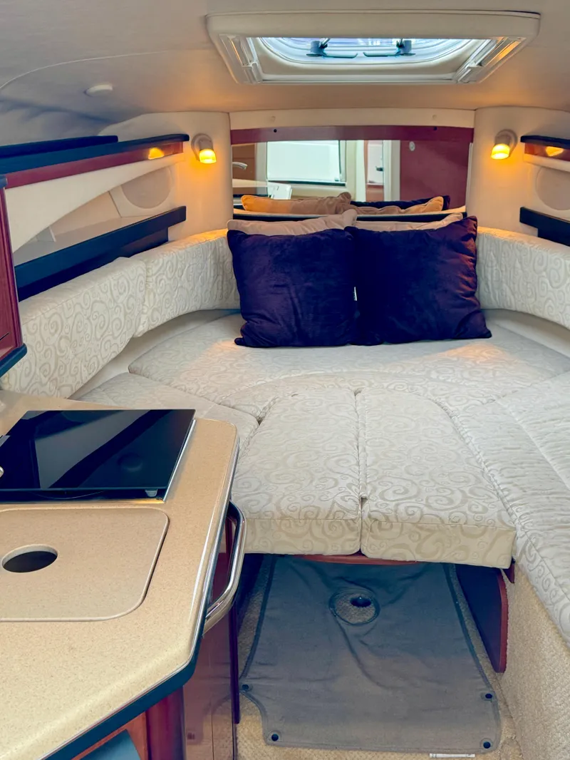 Slide: The Image of Interior of a 2005 Sea Ray Sundancer 260 yacht with cozy bed. - 26