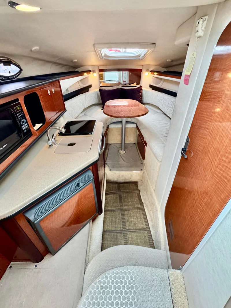Slide: The Image of Interior of 2005 Sea Ray Sundancer 260 boat cabin. - 29