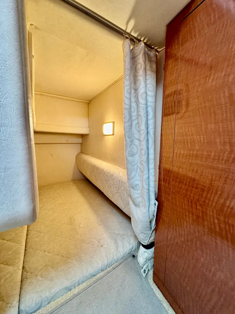 Slide: The Image of Interior of 2005 Sea Ray Sundancer 260 with sleeping area. - 38