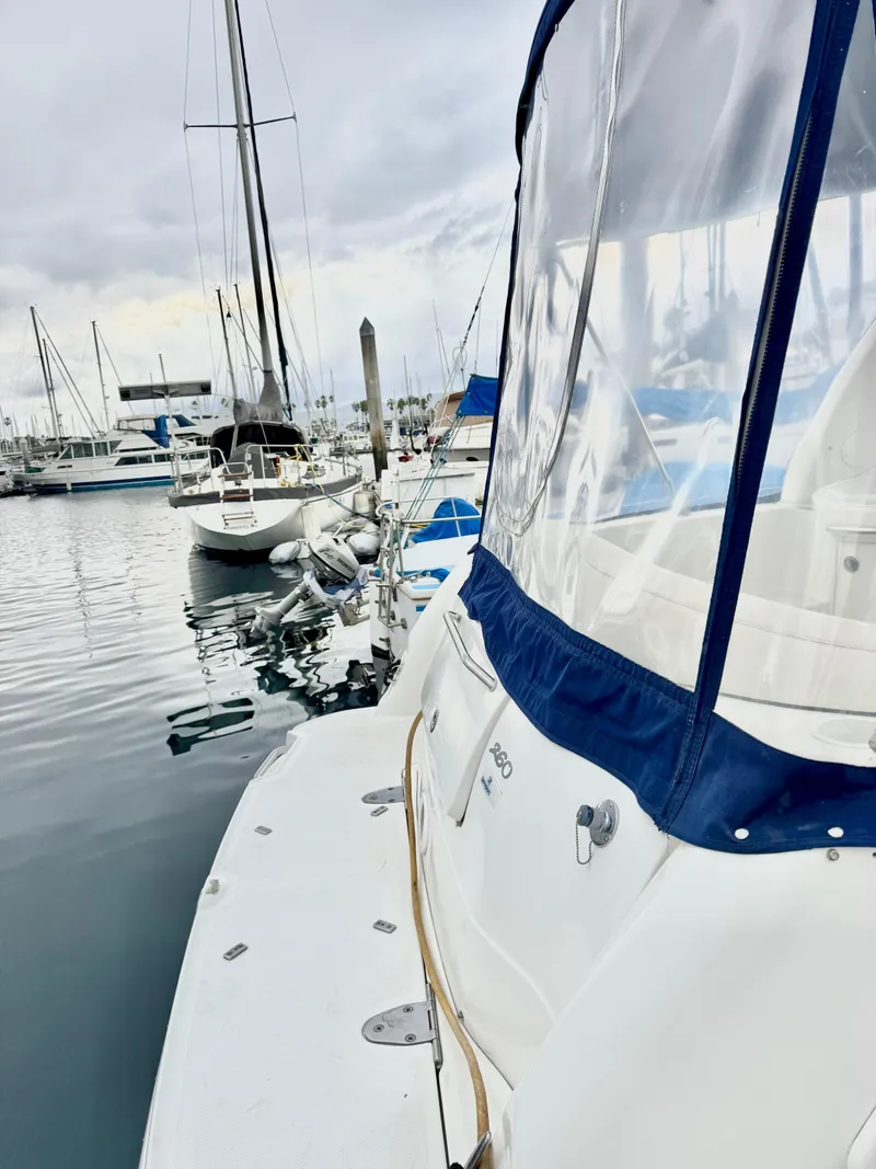 Slide: The Image of 2005 Sea Ray Sundancer 260 docked in marina. - 40