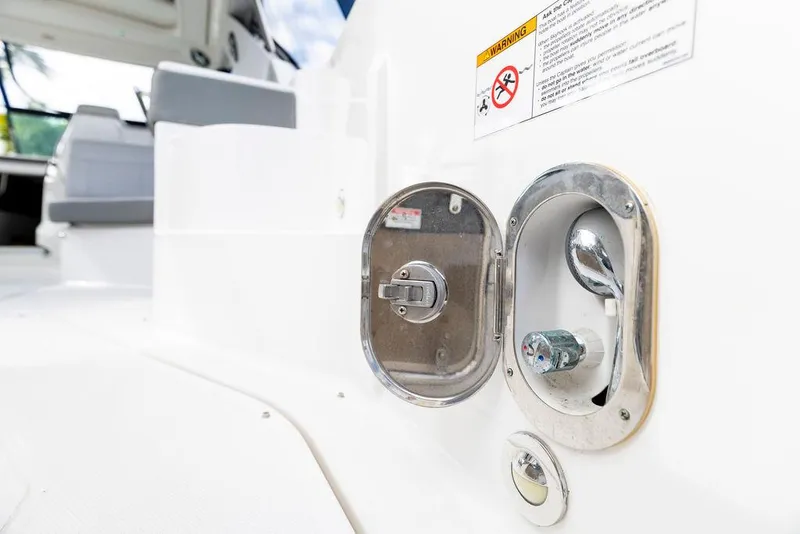 Slide: The Image of 2020 Sea Ray Sundancer 320 boat deck with fuel and water access ports. - 10