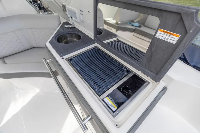 Slide: The Image of 2020 Sea Ray Sundancer 320 yacht kitchenette with sink and grill. - 13