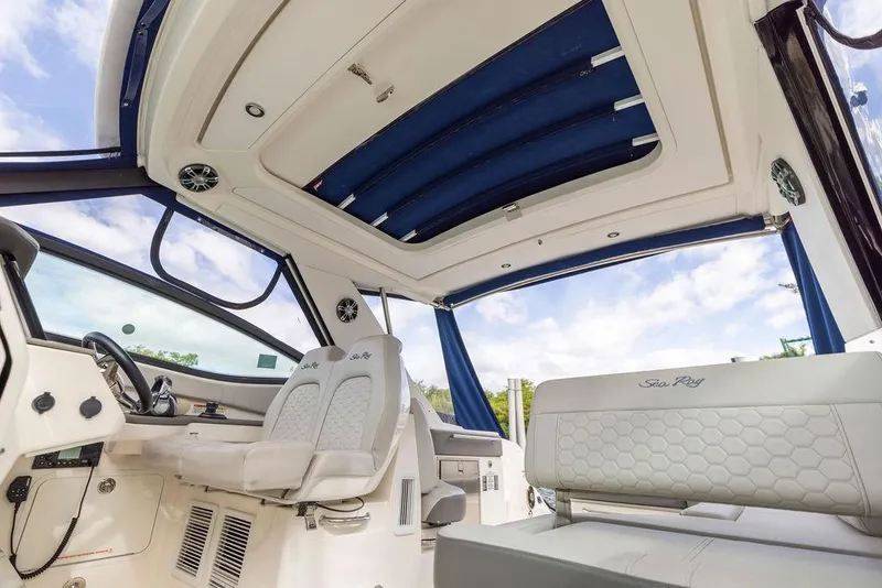 Slide: The Image of 2020 Sea Ray Sundancer 320 interior with luxurious seating and modern design. - 30