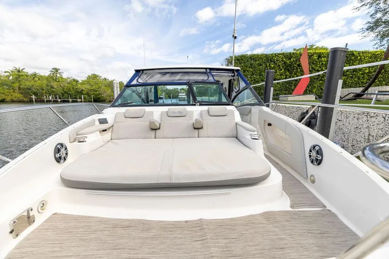 Slide: The Image of 2020 Sea Ray Sundancer 320 boat with spacious deck and seating area. - 36