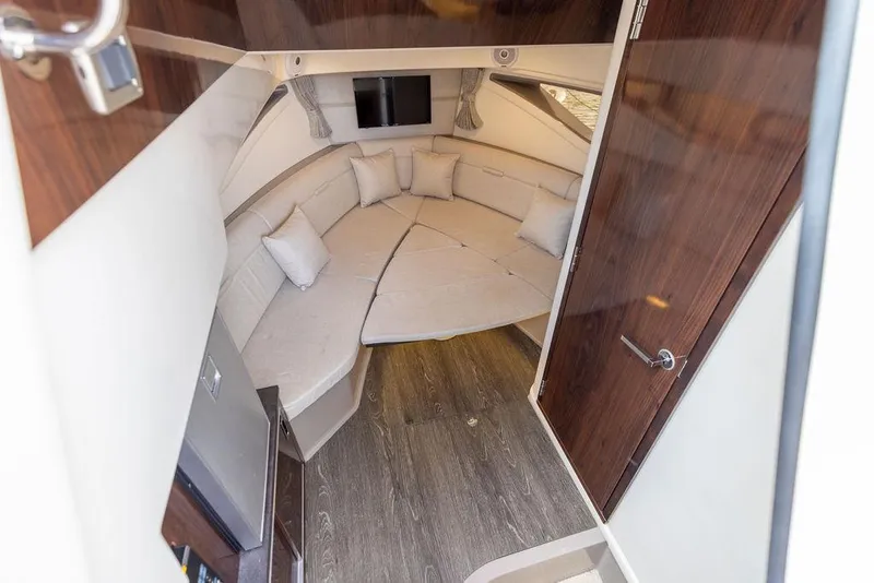 Slide: The Image of 2020 Sea Ray Sundancer 320 cabin interior with plush seating and modern design. - 39