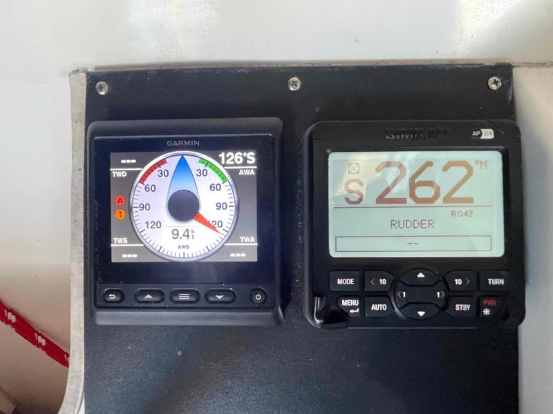 Slide: The Image of Navigation instruments on a 2000 Manta 42 Catamaran, displaying wind and rudder data. - 38