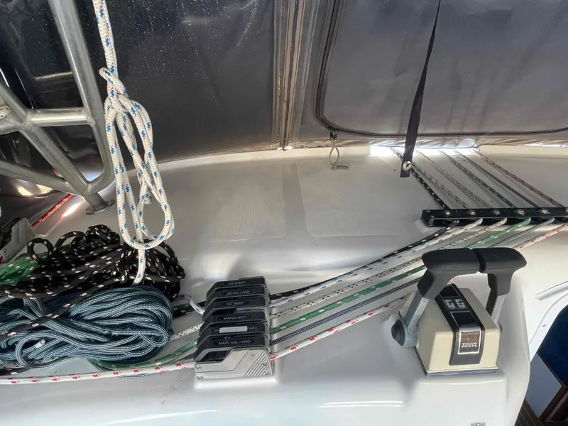 Slide: The Image of Deck of 2000 Manta 42 Catamaran with ropes and control levers. - 41