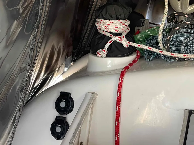 Slide: The Image of Manta 42 Catamaran 2000 deck with ropes and sailing equipment. - 42