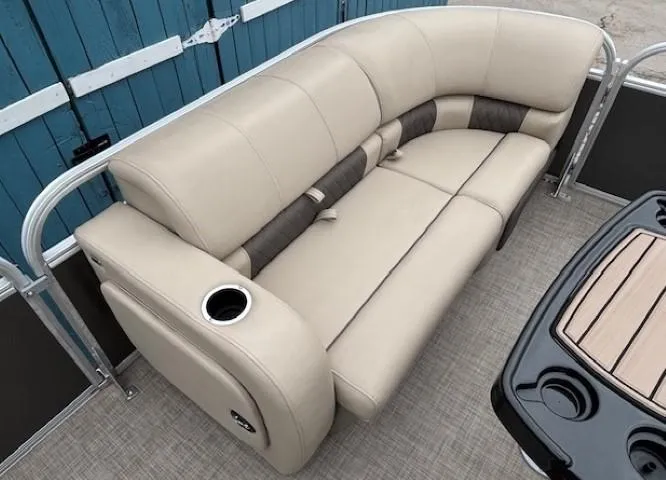 Slide: The Image of 2023 Sun Tracker Party Barge 22 RF XP3 interior seating with cup holder and table. - 11