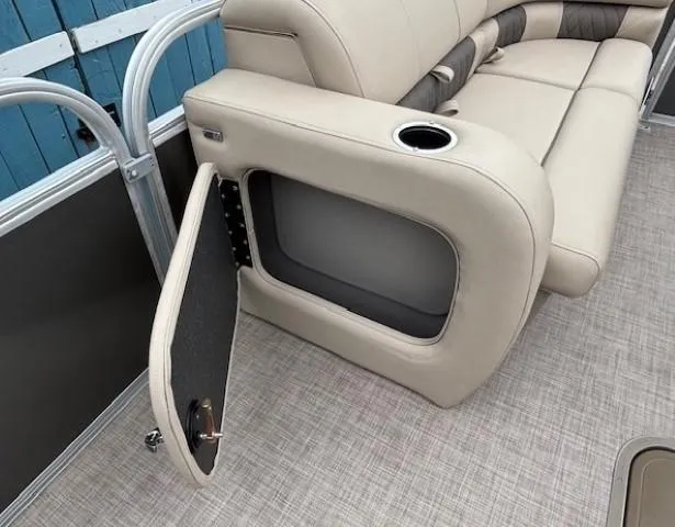 Slide: The Image of 2023 Sun Tracker Party Barge 22 RF XP3 interior with open storage compartment. - 13