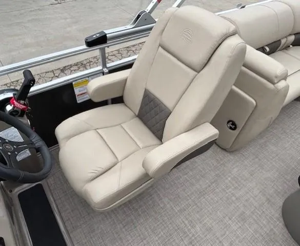 Slide: The Image of 2023 Sun Tracker Party Barge 22 RF XP3 captain's chair, beige upholstery, modern design. - 18
