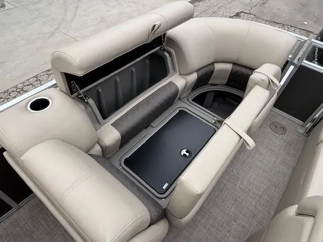 Slide: The Image of 2023 Sun Tracker Party Barge 22 RF XP3 interior seating with storage compartments. - 23