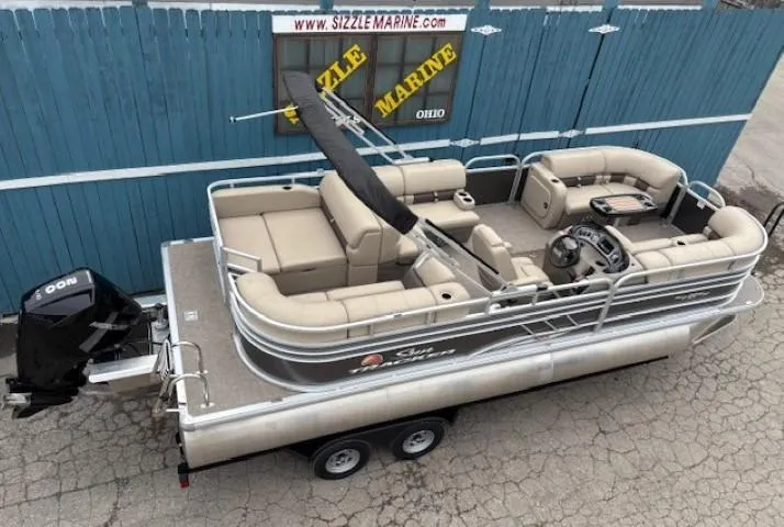 Slide: The Image of 2023 Sun Tracker Party Barge 22 RF XP3 pontoon boat on trailer, beige seating, outboard motor. - 7