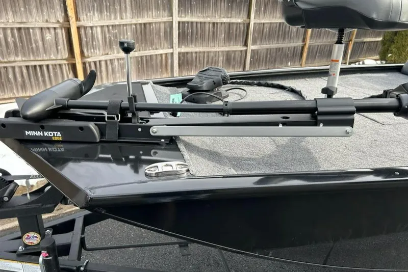 Slide: The Image of 2025 Tracker Pro 170 boat with Minn Kota trolling motor on deck. - 7