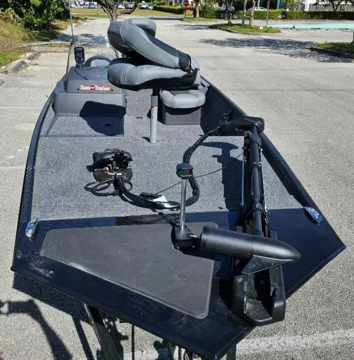 Slide: The Image of 2025 Tracker Bass Tracker Classic XL boat with fishing seats and trolling motor. - 4