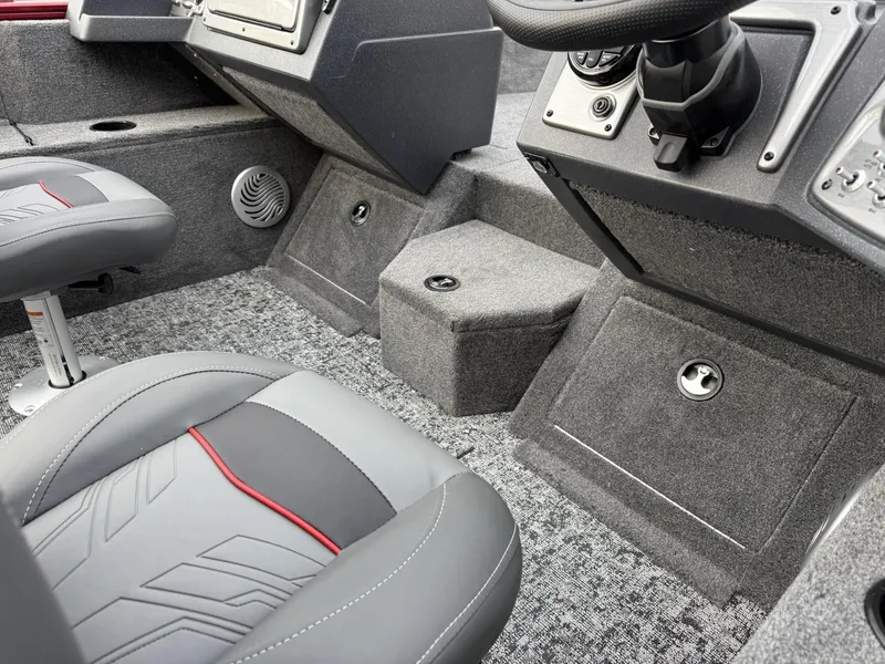 Slide: The Image of 2025 Tracker Pro Guide V-175 WT interior, featuring gray seating and carpeted flooring. - 14