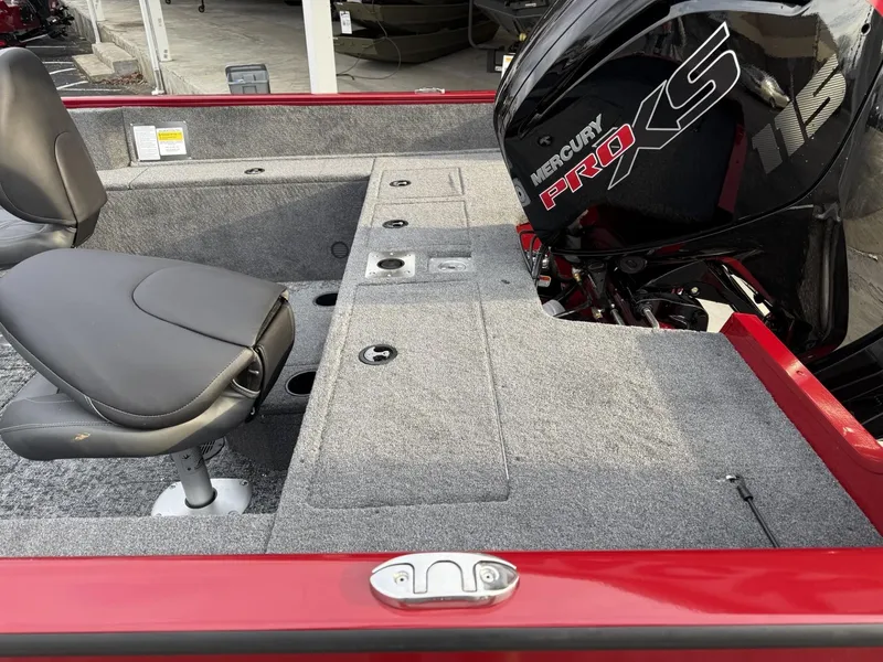 Slide: The Image of 2025 Tracker Pro Guide V-175 WT boat interior with Mercury Pro XS engine. - 5