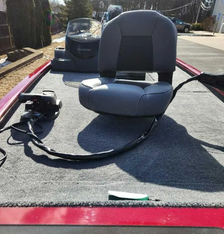 Slide: The Image of 2025 Tracker Pro 170 boat interior with seating and control equipment. - 4