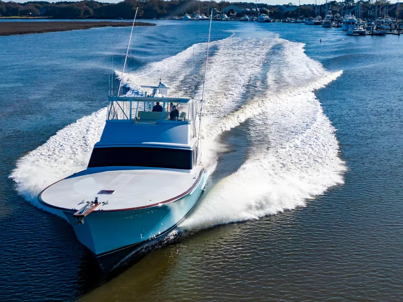 Slide: The Image of Custom Carolina 66 yacht cruising on a sunny day, 2005 model. - 3