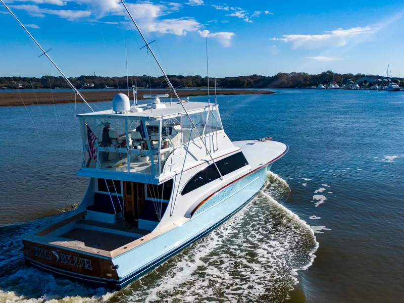 Slide: The Image of Custom Carolina 66 yacht cruising on a sunny day, 2005 model. - 6